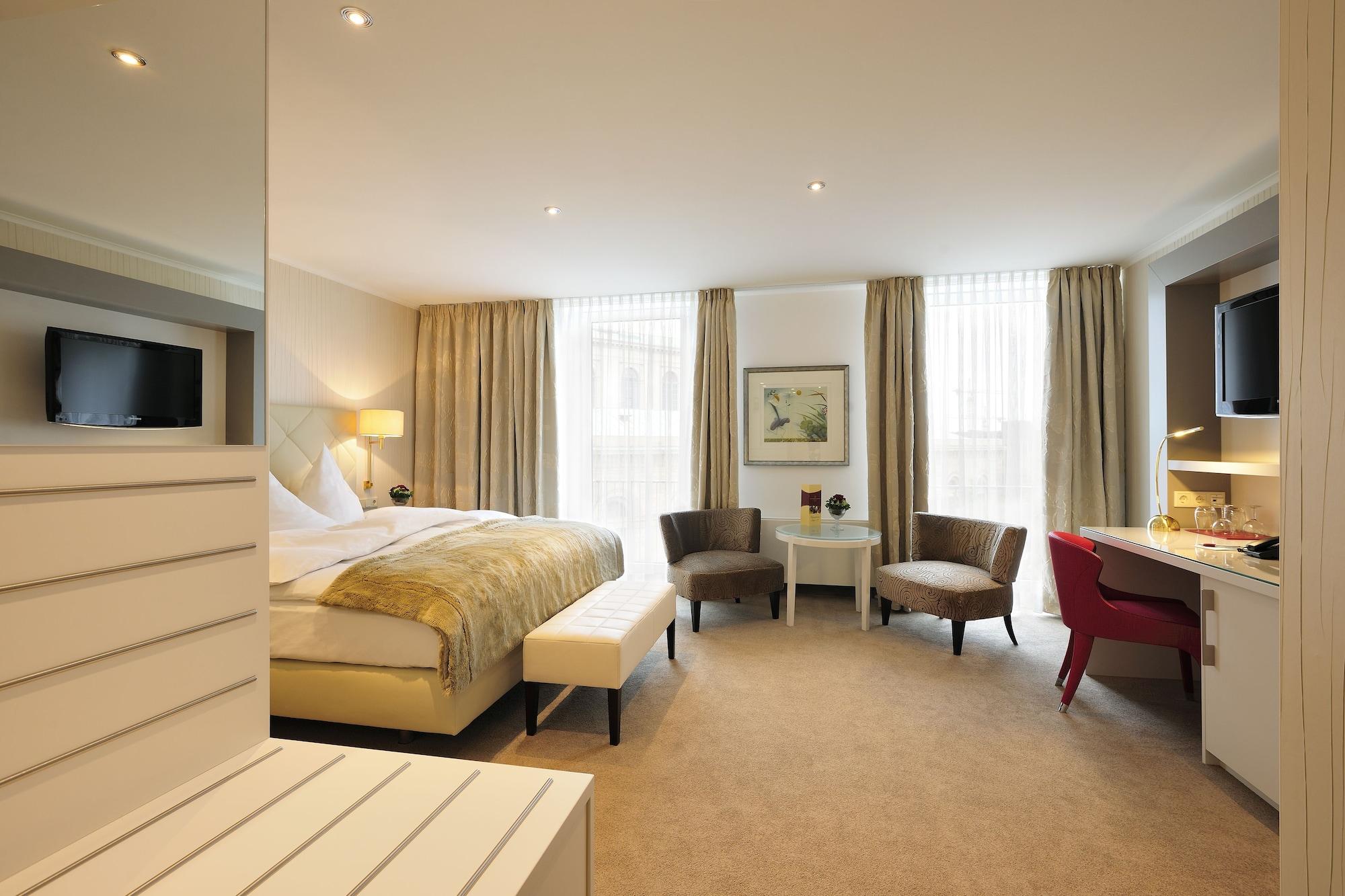 카스텐스 호텔 루이젠호프 하노버 외부 사진 A typical room at the hotel