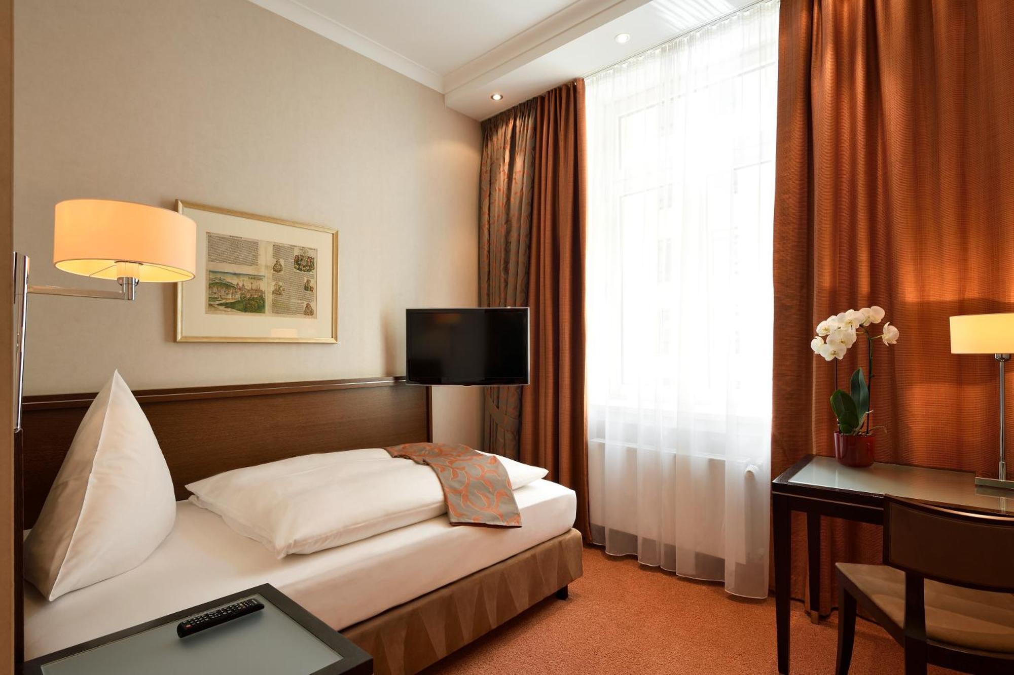 카스텐스 호텔 루이젠호프 하노버 외부 사진 A room at the Hotel de France