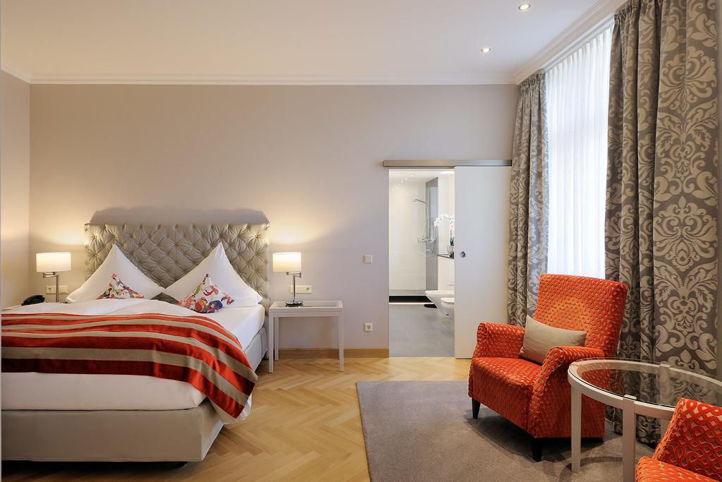 카스텐스 호텔 루이젠호프 하노버 외부 사진 A room at the Hotel Axelmannstein